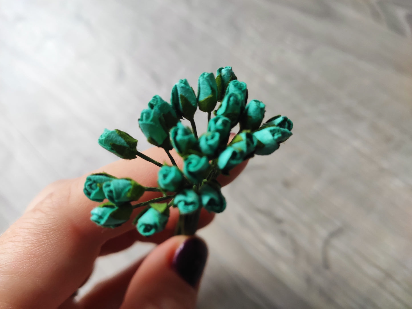 Set of tiny turquoise flowers